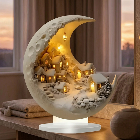 Luz decorativa de luna y aldea encendida en una estantería del salón
