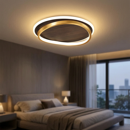 Lámpara de techo LED moderna encendida en un dormitorio